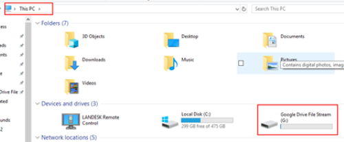 The Google drive file stream sitting within the This PC section of file explorer both highlighted in red